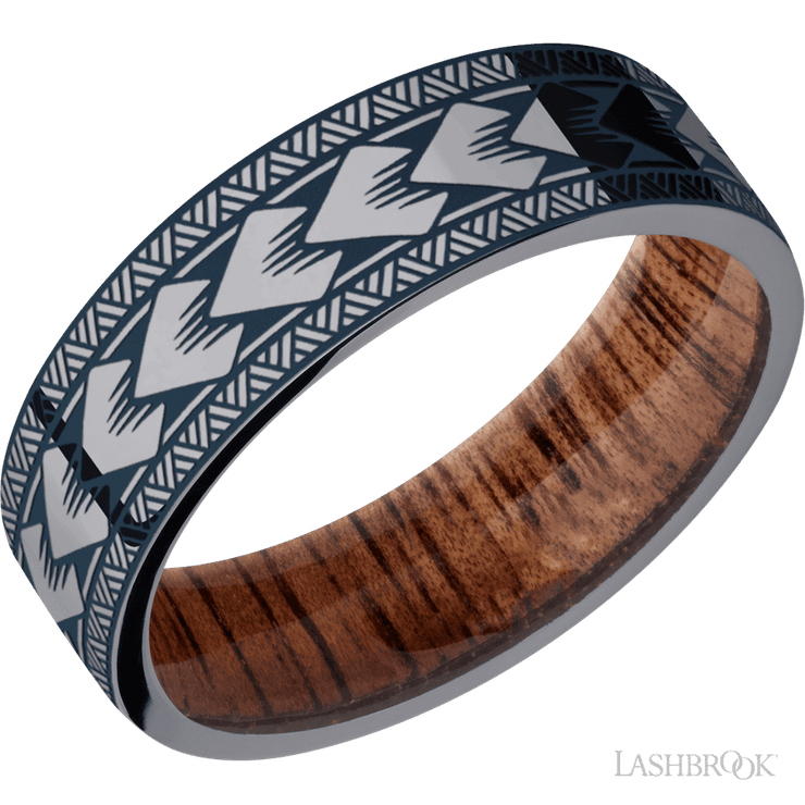 7 mm wide/Flat/Tantalum band with a laser carved Maori pattern also featuring a Koa sleeve.