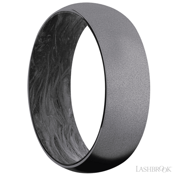 7 mm wide Domed Tantalum band featuring a Forged Carbon Fiber sleeve.