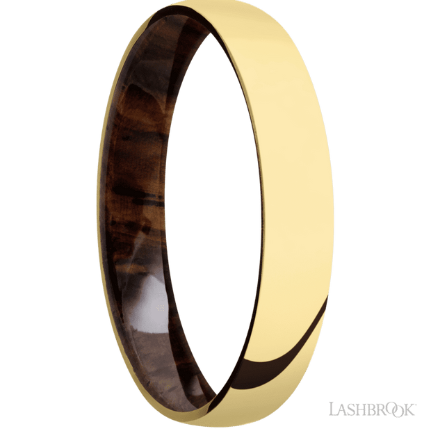 4 mm wide Domed 14K Yellow Gold band featuring a Cocobolo sleeve.