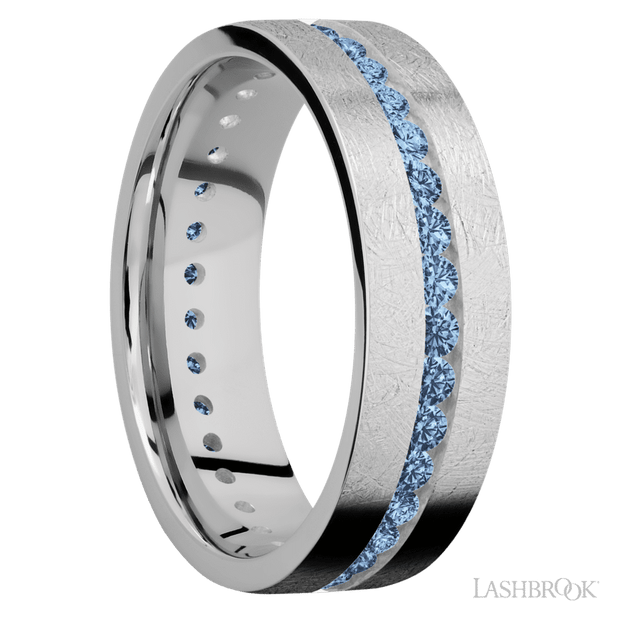 7 mm wide/Flat/14K White Gold band with an Eternity arrangement of .03 carat Round Denim Sapphire stones in a Channel setting.