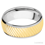 8 mm wide/Domed/14K White Gold band with one 6 mm Centered inlay of 14K Yellow Gold with a machined Ripple pattern.